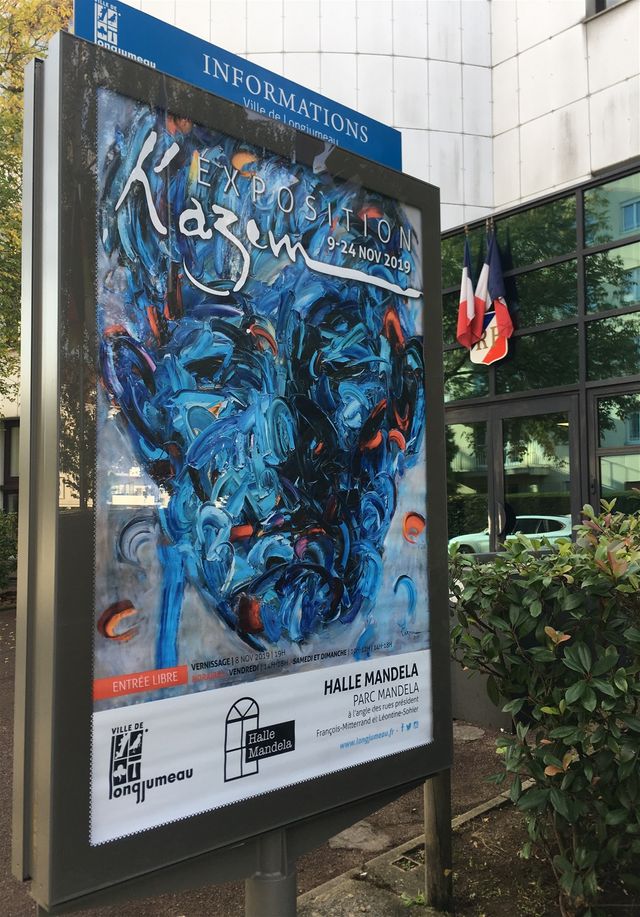 Affiche de l’exposition de Kazem devant l’Hôtel de Ville de Longjumeau